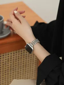 Stainless steel metal link watch strap detail view, elegant silver tone, comfortable daily wear.