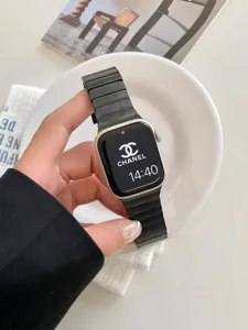 Metal one-bead watch band replacement strap for Apple Watch with butterfly buckle accessory.