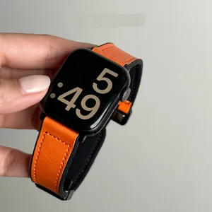Gedetailleerd overzicht van de oranje lederen siliconen magnetische horlogeband voor Apple.