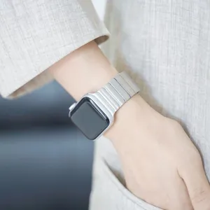 Replacement metal strap for Apple Watch, sleek silver single bead design with butterfly clasp.
