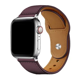 Bracelet en cuir pour Apple Watch, design vintage avec rivet en métal, élégant et durable.