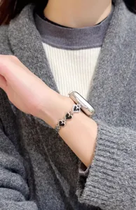 Metal heart watch strap detail view for smart watch replacement classy fashion accessory.