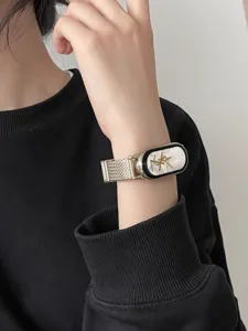 Metal magnetic mesh replacement strap for smart fitness band with elegant wheat grain pattern.