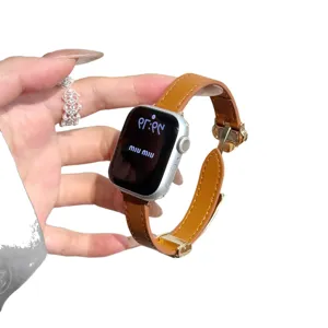 Leather watch strap for Apple Watch with magnetic clasp and stylish design for daily wear.