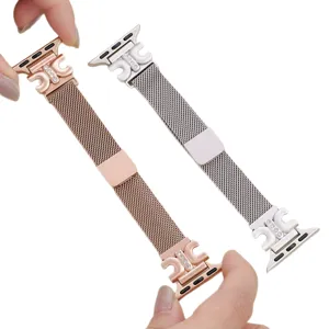 Cinturino di ricambio in metallo milanese per Apple Watch con quadrifoglio strass.