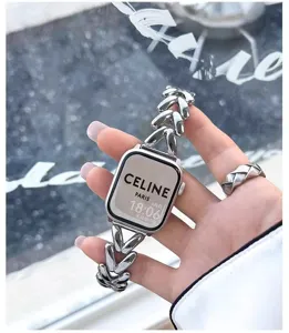 Metal chain strap compatible with Apple Watch, stylish stainless steel replacement band.