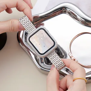 Stainless steel rhinestone watch band detail for Apple Watch, sparkling metal strap.
