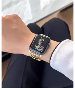 Detailed close-up of luxury metal chain watch strap compatible with smartwatches.