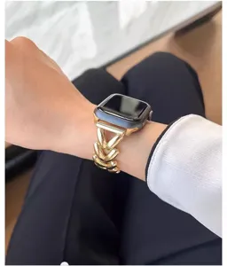 Gold metal chain watch strap compatible with smart watch, elegant heart link design for women.