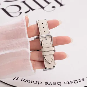 Replacement leather watch band compatible with Apple Watch, beige strap with silver buckle.
