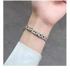 Metal chain strap compatible with Apple Watch, fine H-link design for women, elegant smart watch band.