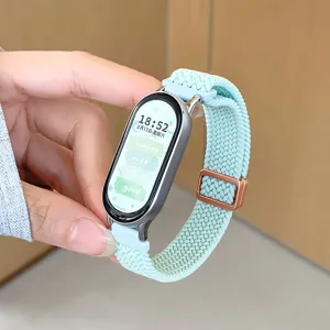 Replacement nylon braided elastic watch band for smart fitness tracker, comfortable fit.