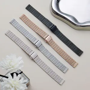 Stainless steel metal watch band detail showing starry sky mesh texture and secure folding buckle.