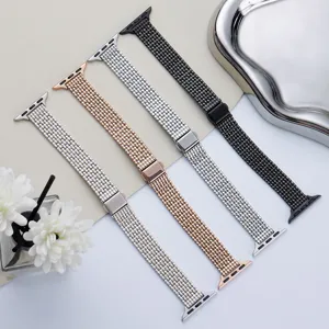 Stainless steel metal watch band detail showing multi-color options with folding buckle.