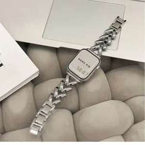 Metal chain watch band compatible with Apple Watch, stylish heart link strap replacement.