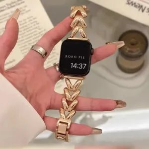 Metal watch strap for Apple Watch, rose gold clover chain link luxury design for women.
