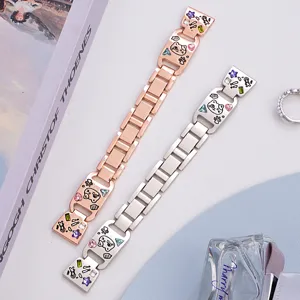 Detail view of metal smartwatch replacement bands with sparkling cubic zirconia and cute cat motifs.