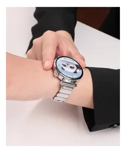 Metal watch strap replacement for smart watch, stylish silver stainless steel design with links.