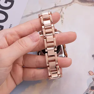 Rose gold metal watch band replacement compatible with smart watch, stainless steel link strap.