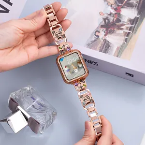 Rose gold metal Apple Watch band for women, sparkly rhinestone charm bracelet strap replacement.