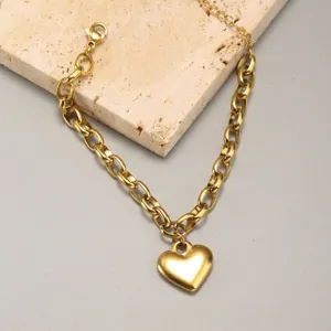 Bracciale catena in acciaio inossidabile 304L dorato con pendente a cuore e chiusura regolabile.