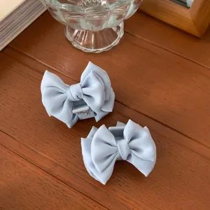 Light blue satin bow hair claw clip, small size sweet princess hair styling accessory for women.