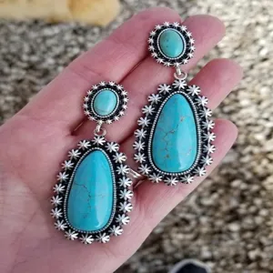 Bohemian vintage silver plated turquoise drop earrings featuring sunburst decorative metal edges