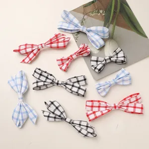 Cute plaid fabric bow hair clips set, vintage gingham hairpins for DIY accessories and styling.