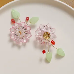 Handmade crystal flower earrings diy beading material with elegant green leaves.
