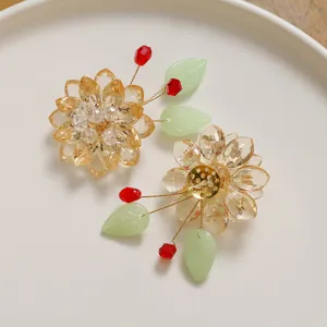 Handmade crystal lotus flower hair accessory detail view, DIY beading material components.