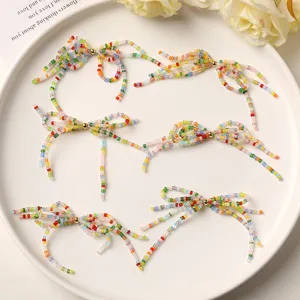 Ciondolo fiocco in perline di rocaille colorate DIY, accessorio artigianale multicolore orecchini.
