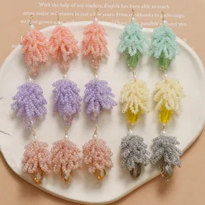 Handmade beaded crystal pinecone pendants DIY charm accessories for earrings and hair clips.