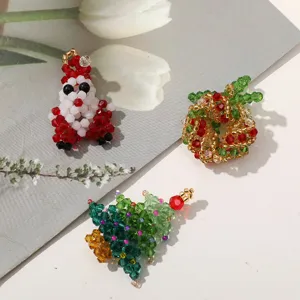 Christmas crystal beaded pendants detail view featuring handmade Santa wreath and tree charms.