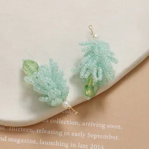 Handmade light green crystal beaded pinecone pendant DIY jewelry making craft supply accessory.