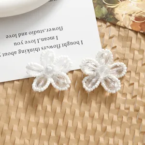 Handmade white crystal beaded flower DIY jewelry accessories for elegant fashion crafts.