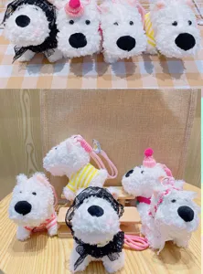 Detail view of cute fluffy white dog plush toy keychain featuring lovely lace collar and tiny shirt.