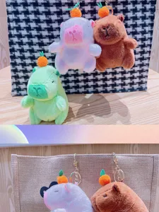 Cute cartoon plush orange capybara keychain, soft stuffed animal bag pendant toy for gifts.