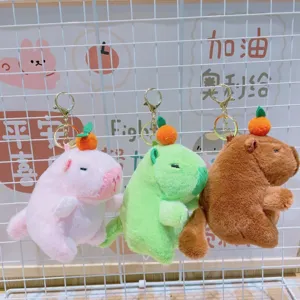 Cute plush capybara keychain with orange head decor, soft stuffed animal bag pendant main view.