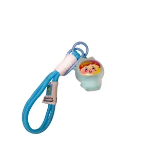 Cute plush cartoon doll keychain with blue braided lanyard and cute character pendant for bags.