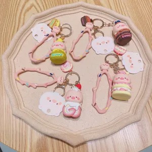 Schattige cartoon varken sleutelhanger set met honingpot en taart bedeltjes voor tas decor.