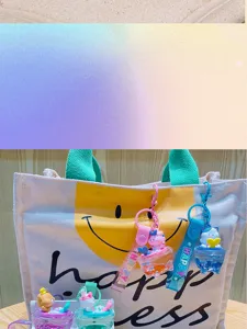 Cute cartoon mermaid quicksand keychain pendant bag charm adorable gift accessory detail view.