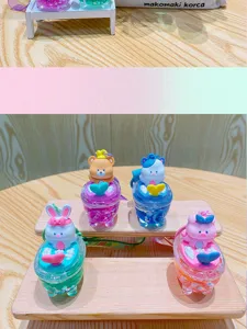 Cute cartoon animal quicksand keychain pendant with liquid glitter bathtub design for bags.