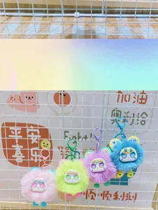 Cute fluffy plush doll keychain detail, soft fur bag charm accessory for daily styling.