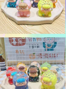 Detailed view of cute fruit liquid quicksand toy figures, perfect desktop and car decoration.