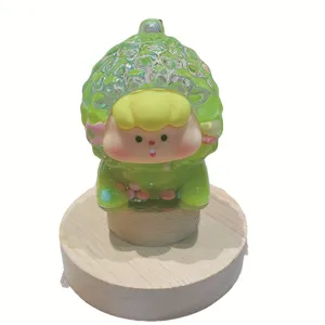 Cute fruit doll cartoon figure desktop car ornament trendy toy with wooden base for home decor.