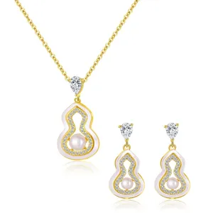 Detailed view of exquisite gourd pearl necklace and earrings set, elegant retro jewelry.