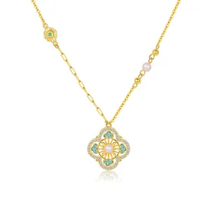 Detailed close-up of S925 silver four-leaf clover pendant necklace with pearls and enamel.