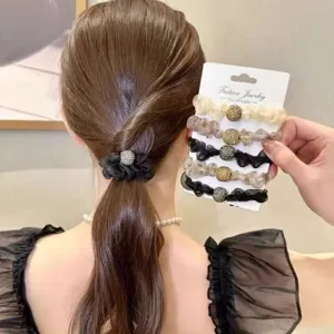 Elegant organza hair scrunchie with rhinestone ball detail, perfect for daily styling and ponytails.