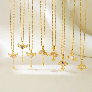 Gold angel wing necklaces set featuring heart crystal and cat's eye stone pendants for women.