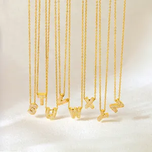 Gold alphabet letter pendant choker necklaces featuring sparkling rhinestone pave details.